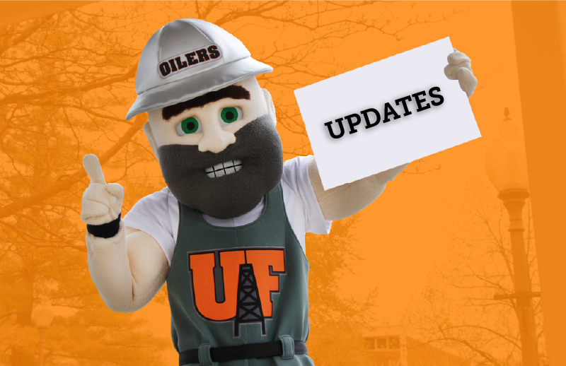 Derrick the Oiler holding a sign saying Updates